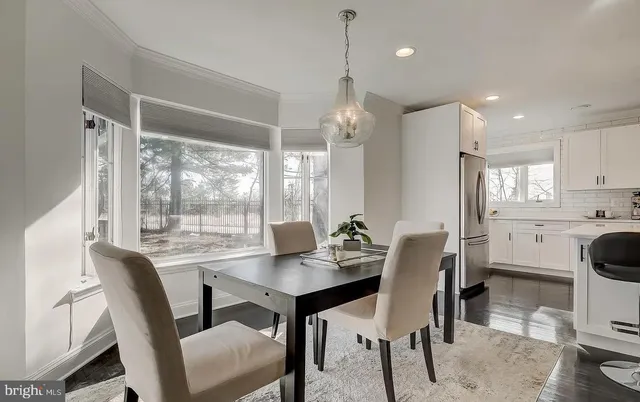 a kitchen with stainless steel appliances granite countertop a stove and a sink