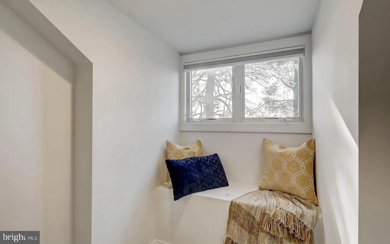 8040 Leishear Road Laurel, MD 20723 - Photo 8 of 66 a bed sitting in a bedroom next to a window