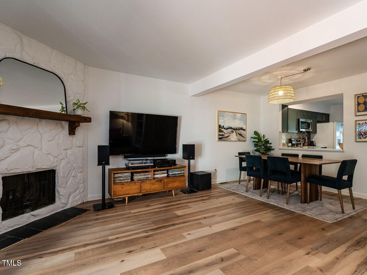 837 Green Ridge Drive Raleigh, NC 27609 - Photo 15 of 29 a living room with furniture and a flat screen tv