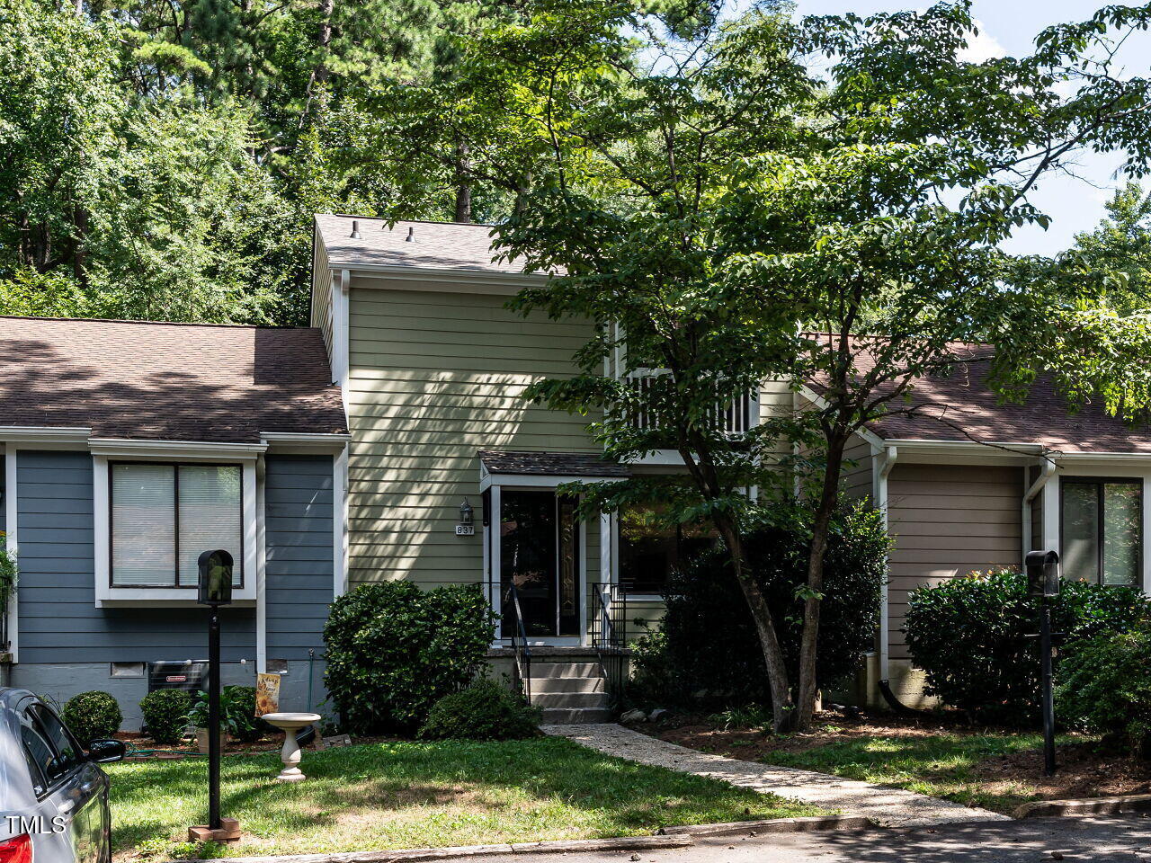 837 Green Ridge Drive Raleigh, NC 27609 - Photo 2 of 29 a house view with a garden space