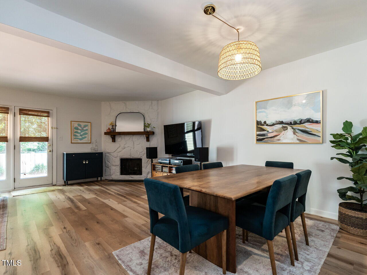 837 Green Ridge Drive Raleigh, NC 27609 - Photo 8 of 29 a view of a dining room with furniture window and wooden floor