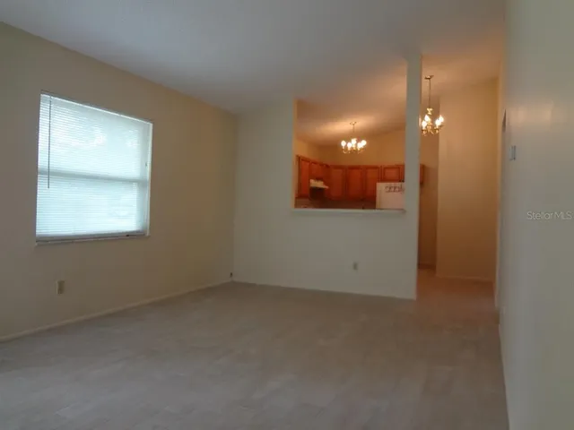 an empty room with a bathroom