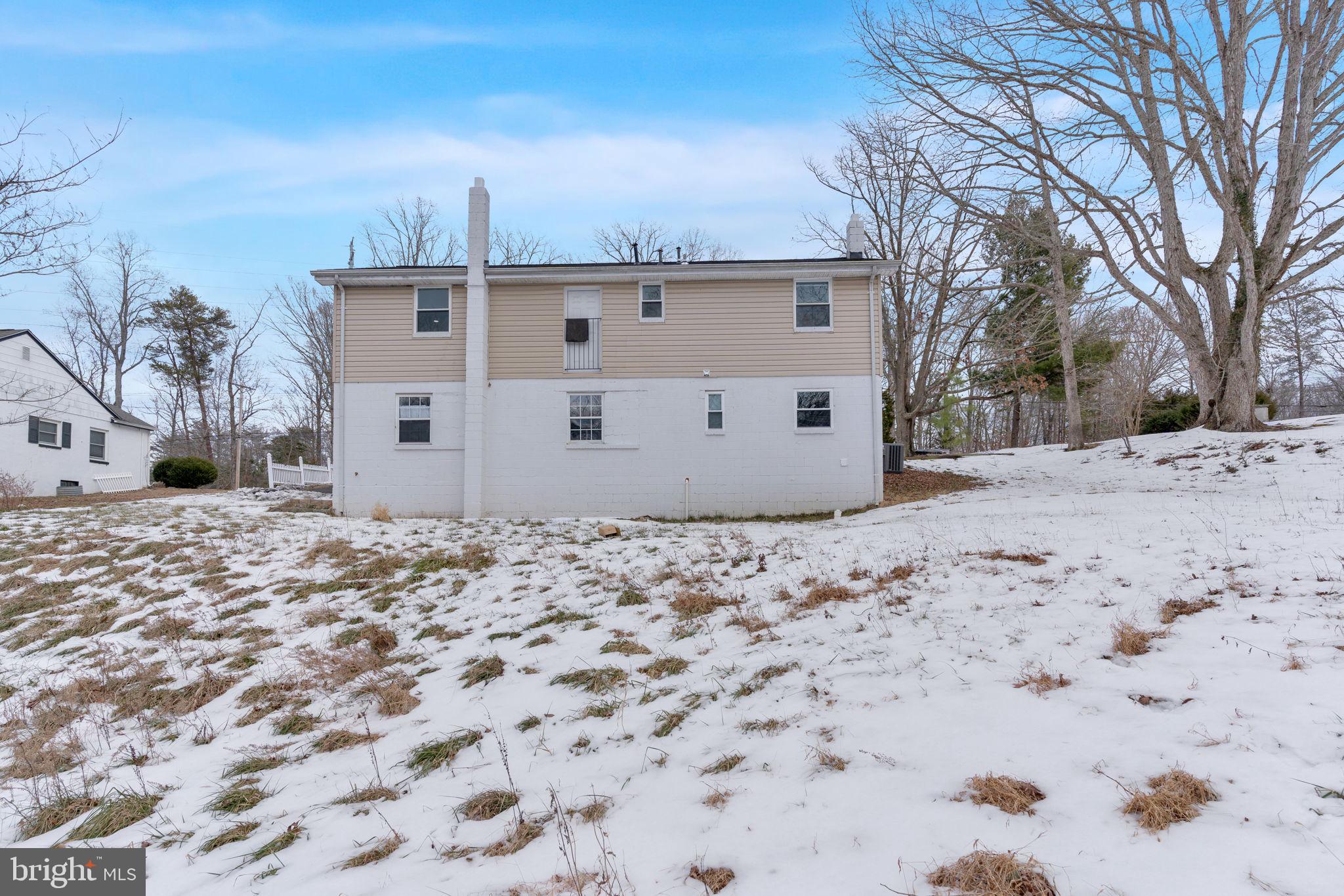 383 Sollers Wharf Road, Unit A Lusby, MD 20657 - Photo 14 of 16 a view of a house with a snow on the road