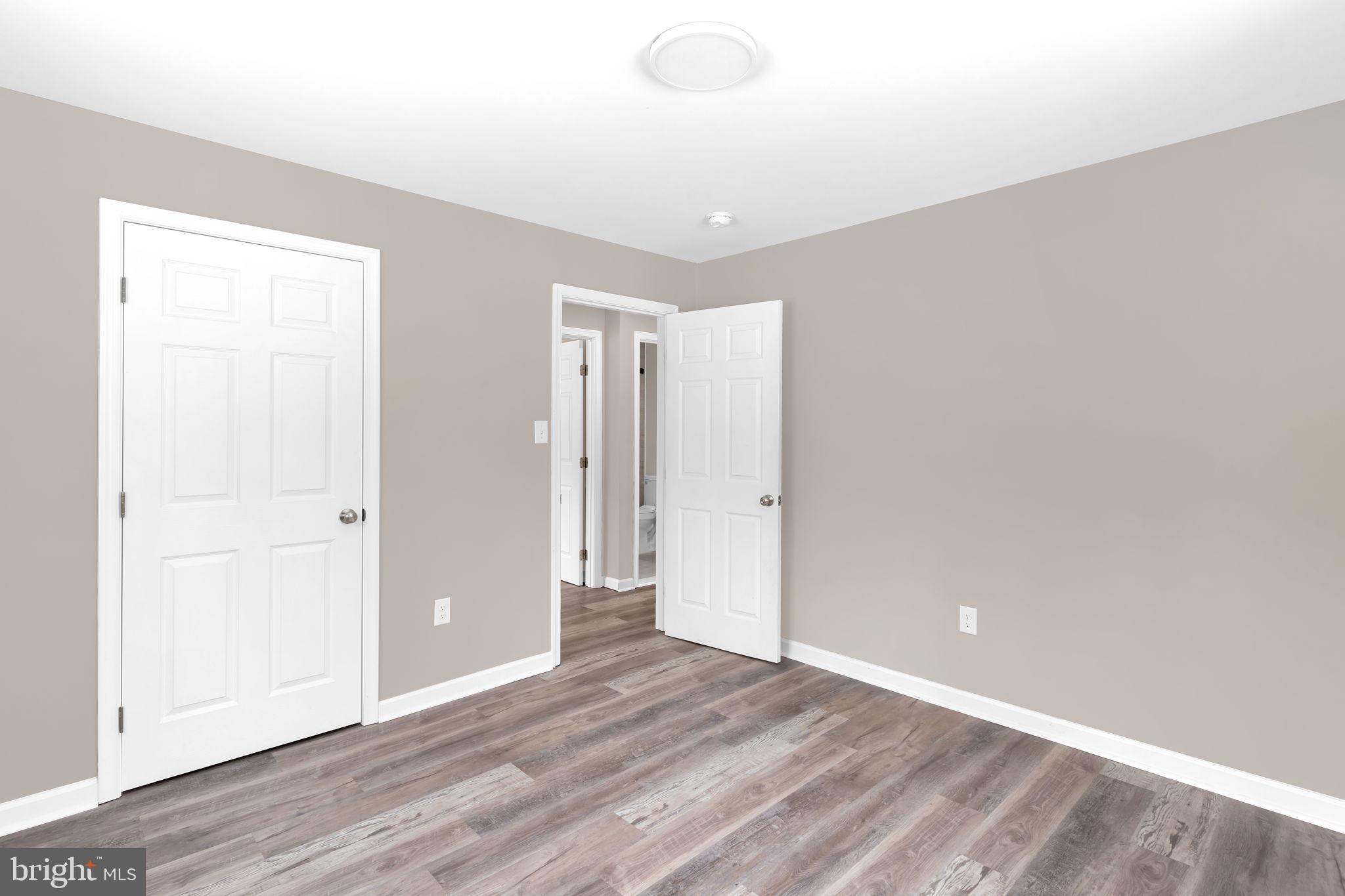 383 Sollers Wharf Road, Unit A Lusby, MD 20657 - Photo 9 of 16 a view of an empty room