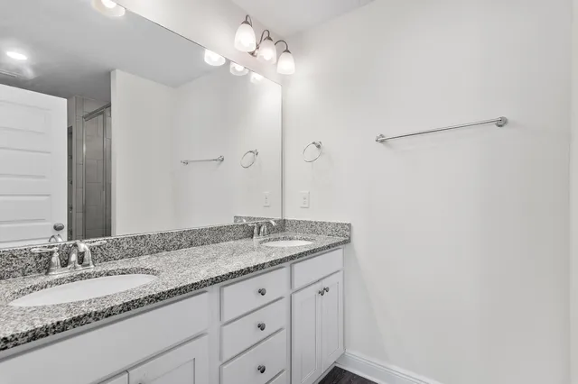 a bathroom with a shower and toilet