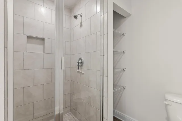 a view of storage and utility room with washer and dryer