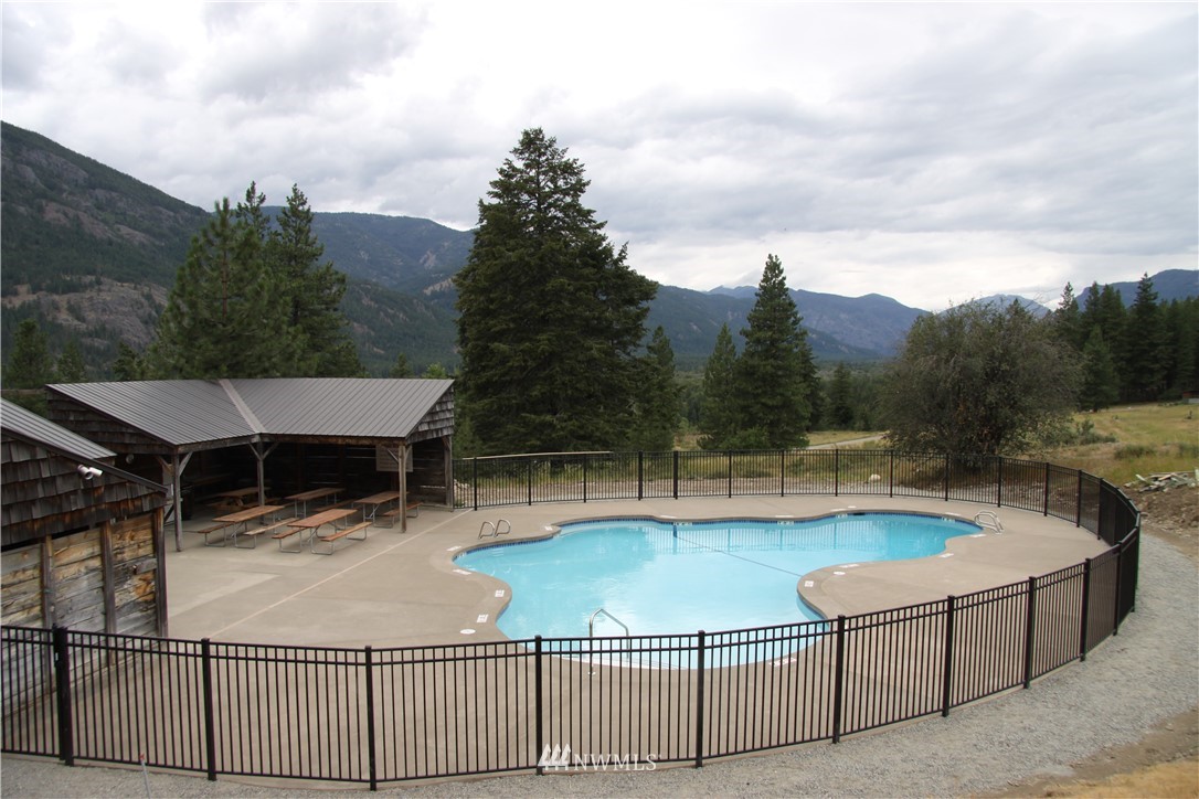 29 Cassal Road Winthrop, WA 98862 - Photo 18 of 19 a view of a swimming pool with a patio