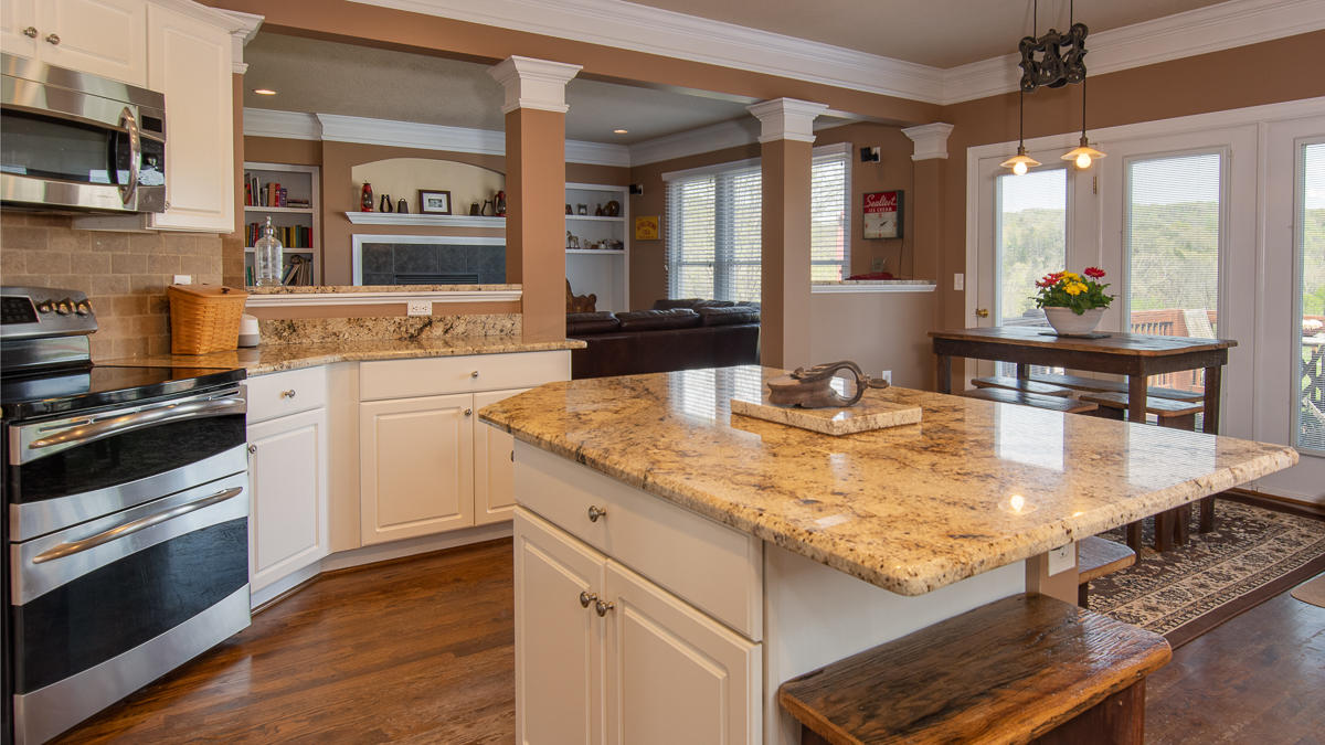 5738 North Fork Road Elliston, VA 24087 - Photo 18 of 77 a kitchen with stainless steel appliances granite countertop a sink stove and cabinets
