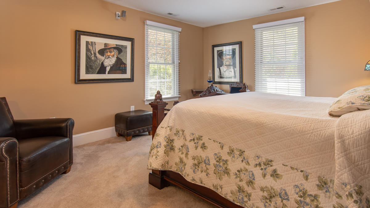 5738 North Fork Road Elliston, VA 24087 - Photo 33 of 77 a bedroom with a bed and a couch
