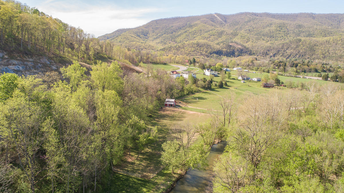 5738 North Fork Road Elliston, VA 24087 - Photo 74 of 77 a view of a lake with mountains in the background
