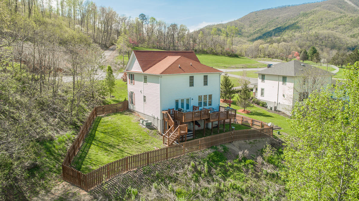 5738 North Fork Road Elliston, VA 24087 - Photo 9 of 77 a aerial view of a house with a yard