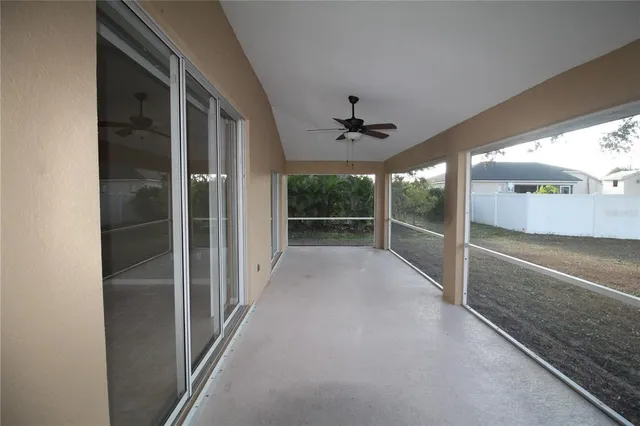 a view of an empty room and window