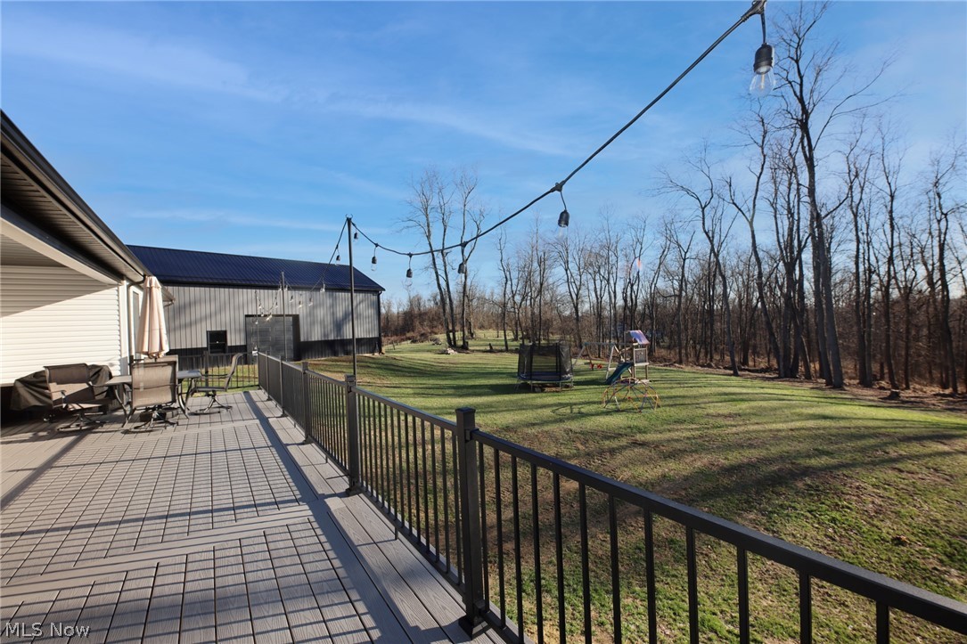 258 Friendly Acres Road Wellsburg, WV 26070 - Photo 33 of 47 Deck overlooking a yard, and a playground