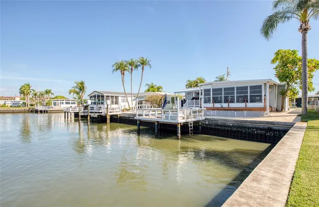a view of swimming pool with outdoor seating