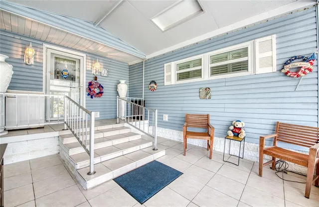 a backyard of a house with seating space