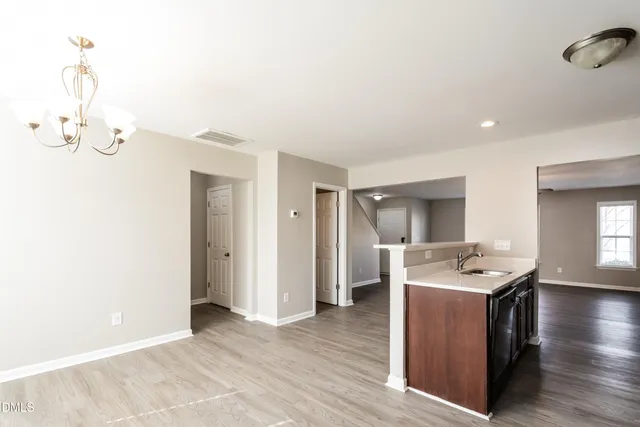 a view of a kitchen and a sink
