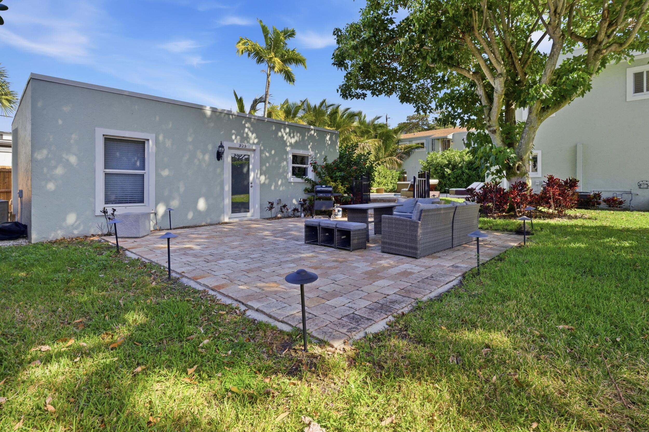 921 Ortega Road West Palm Beach, FL 33405 - Photo 27 of 60 a view of a backyard with sitting area
