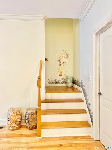 a view of spacious bedroom with an empty room