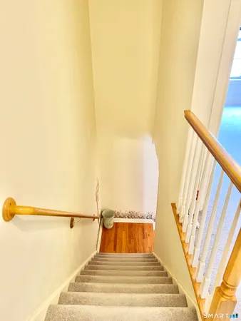 a view of swimming pool with seating area