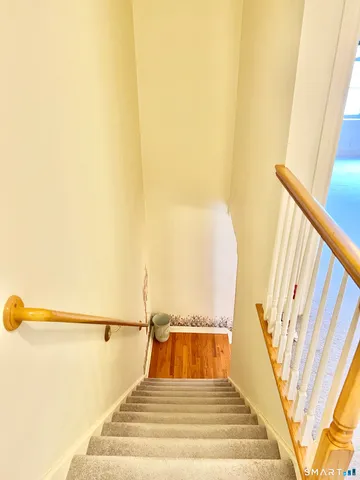 a view of swimming pool with seating area