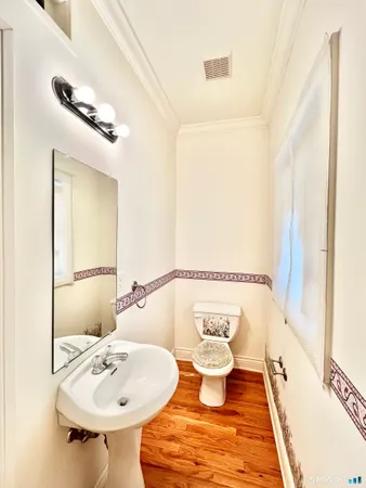 a bathroom with a sink and mirror