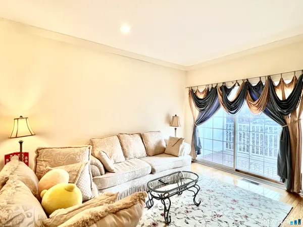 a bedroom with a couch and a couch