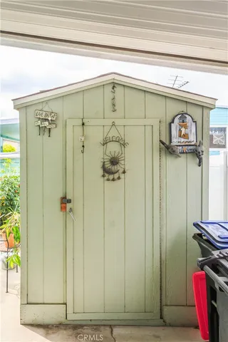 a bathroom with a mirror and a shower