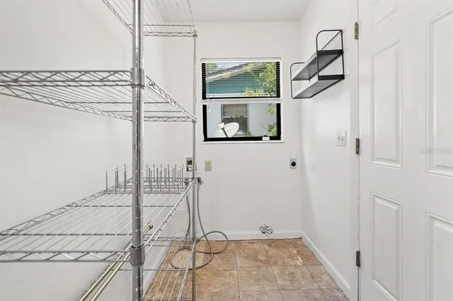 a bathroom with a shower and a mirror