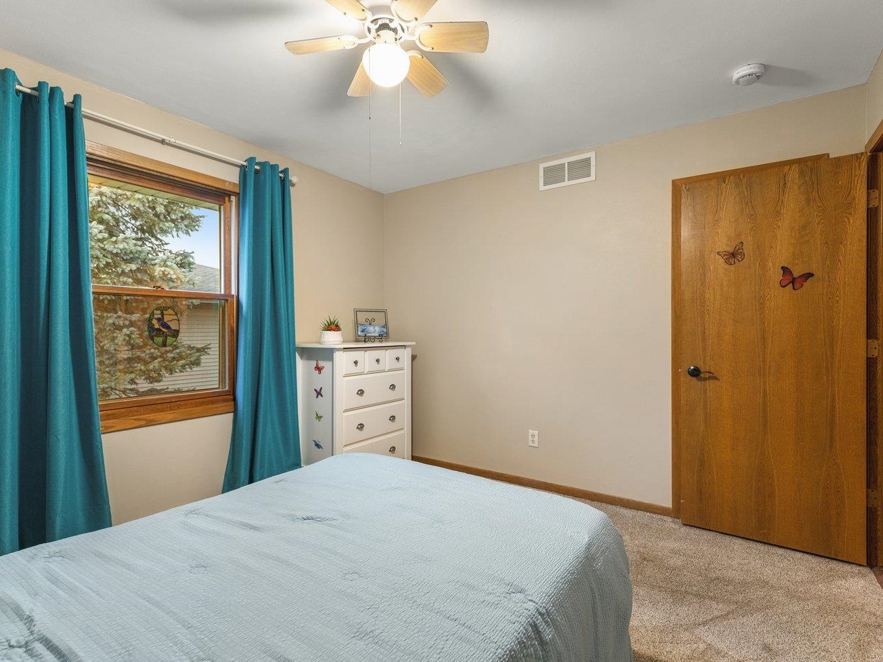 1816 Post Road Beloit, WI 53511 - Photo 23 of 42 a bedroom with a bed and a window