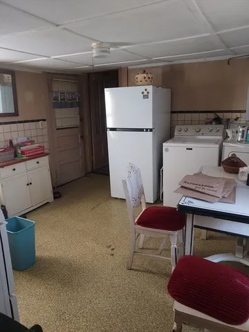 a storage room with washer and dryer