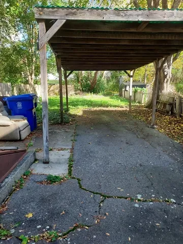 a view of backyard with green space
