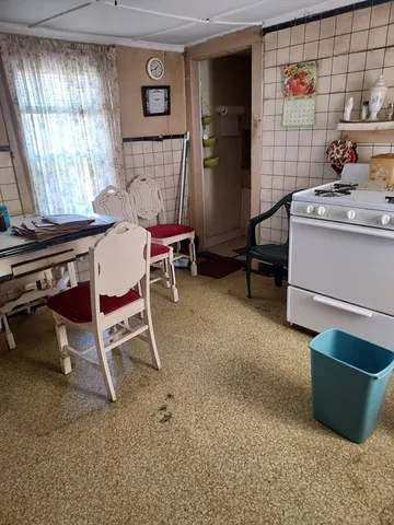 a room with furniture and window