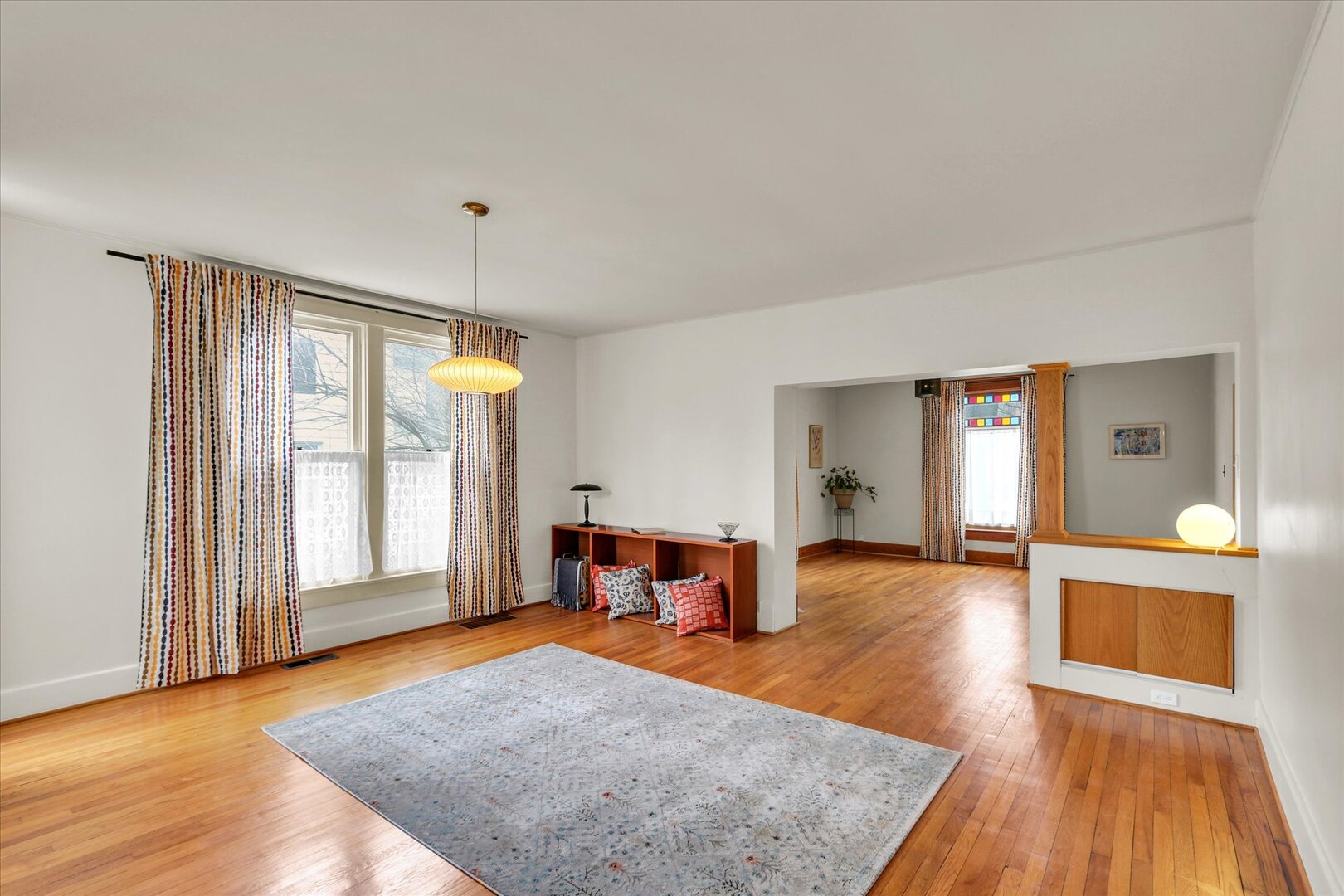 1009 West Church Street Champaign, IL 61821 - Photo 9 of 40 a view of a livingroom with furniture and wooden floor