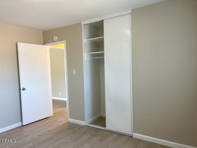 714 West 5th Street, Unit 714D Oxnard, CA 93030 - Photo 6 of 7 a view of an empty room with closet and a window