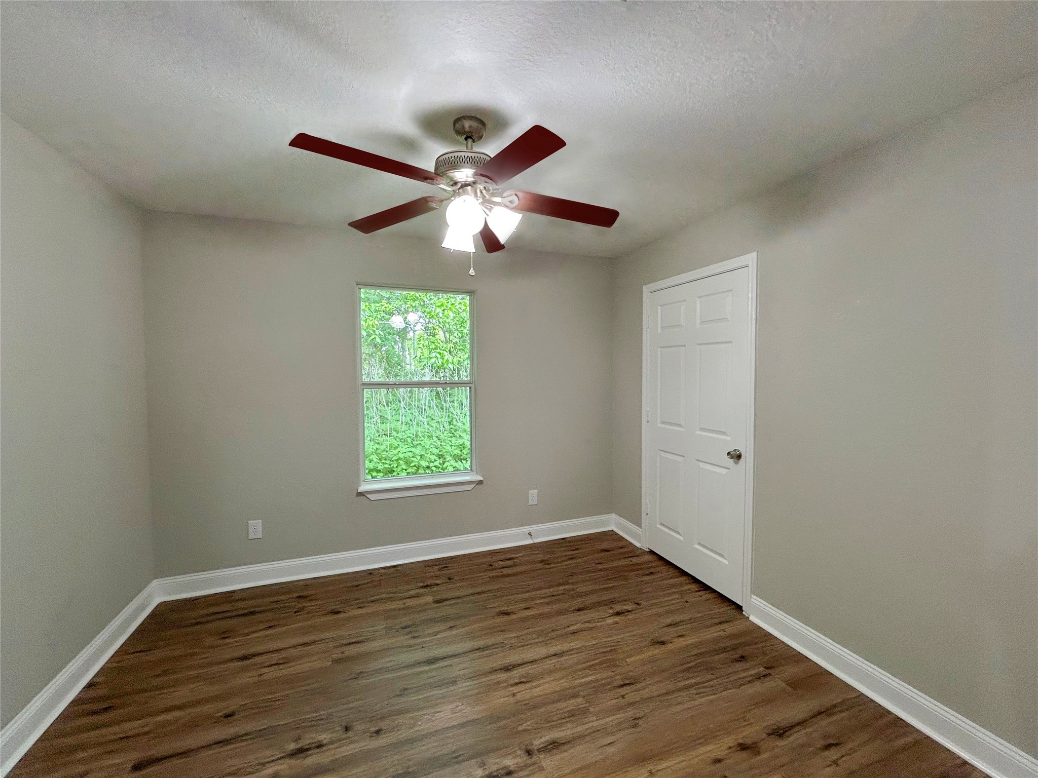 7902 Masters Manvel, TX 77578 - Photo 19 of 21 The secondary bedrooms are spacious and located away from the primary bedroom.