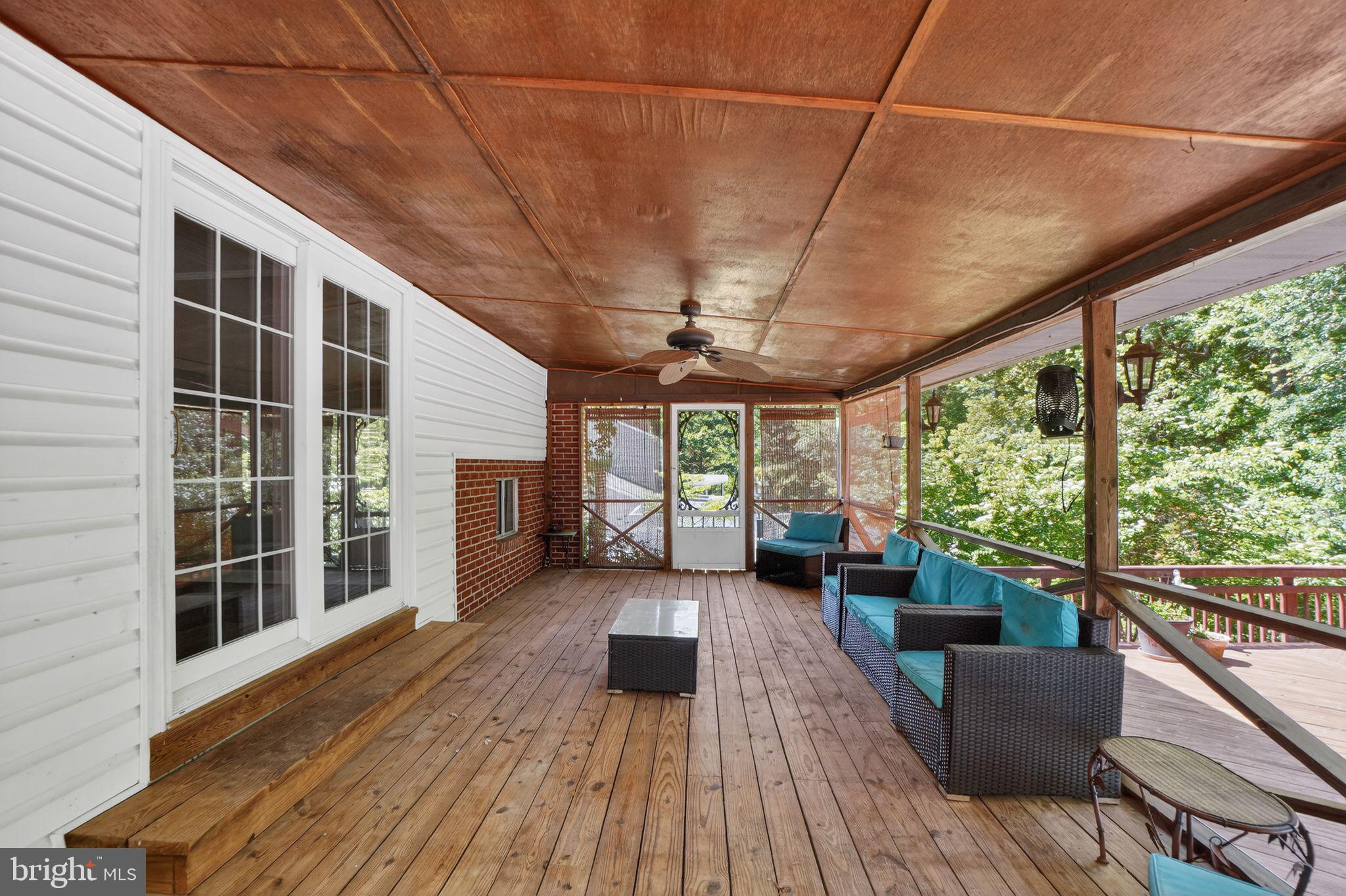 507 Clarks Run Road La Plata, MD 20646 - Photo 42 of 49 Charming screened porch for relaxation.