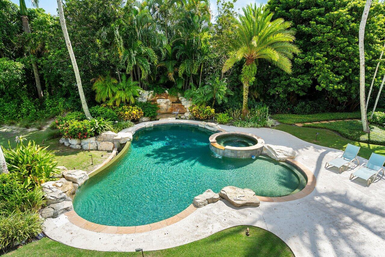 5559 Pennock Point Road Jupiter, FL 33458 - Photo 40 of 72 a view of a wooden ground with large trees