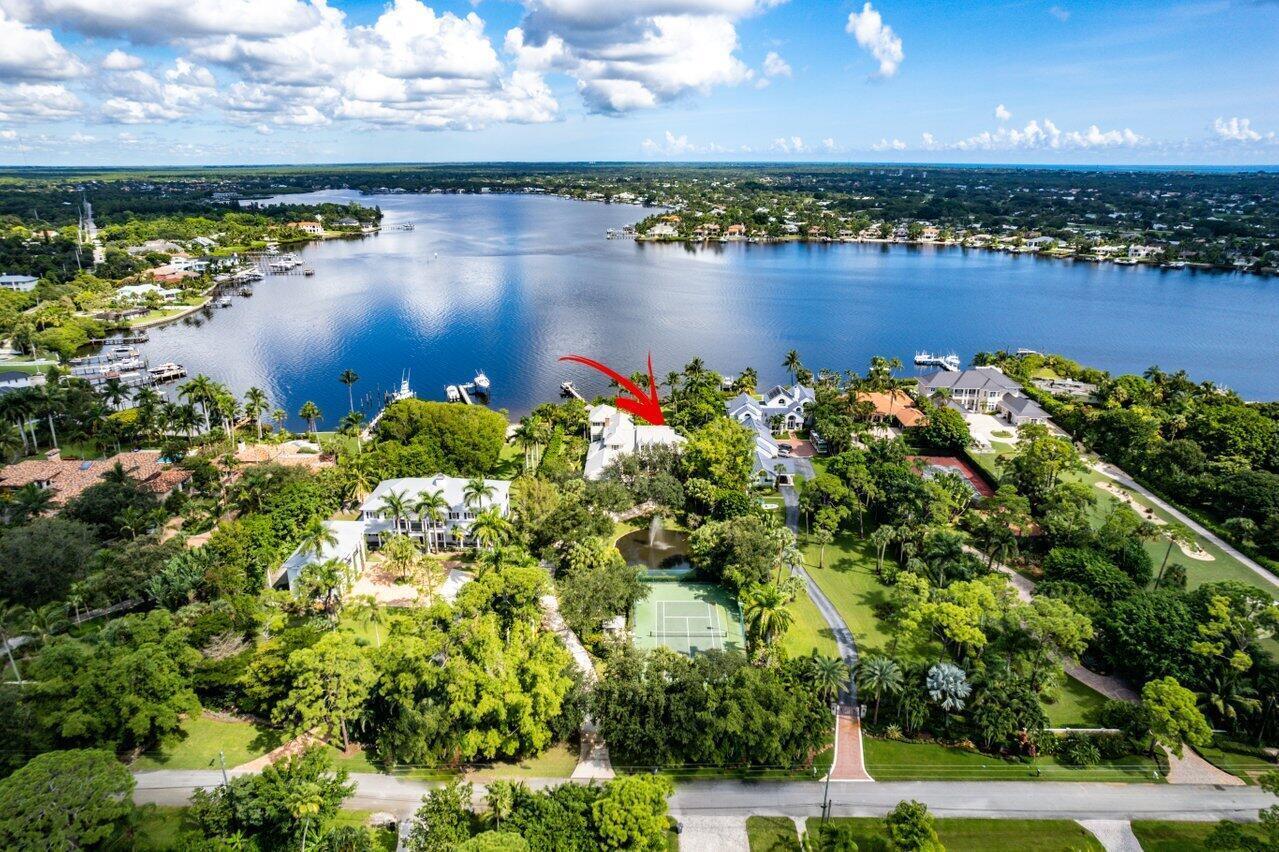 5559 Pennock Point Road Jupiter, FL 33458 - Photo 10 of 72 an aerial view of a houses with ocean view
