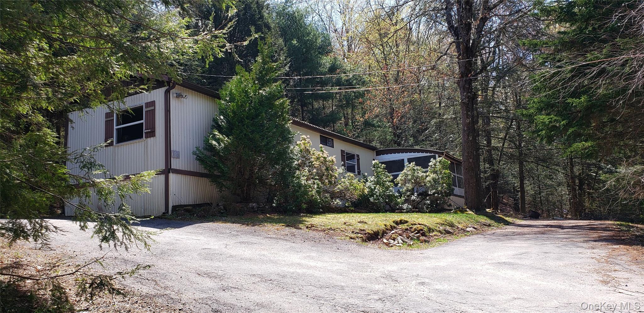 84 Elliott Road Mountain Dale, NY 12763 - Photo 1 of 1 a view of a house with a yard
