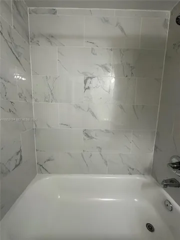 a bathroom with a bathtub