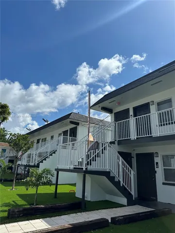 a view of a porch with a yard