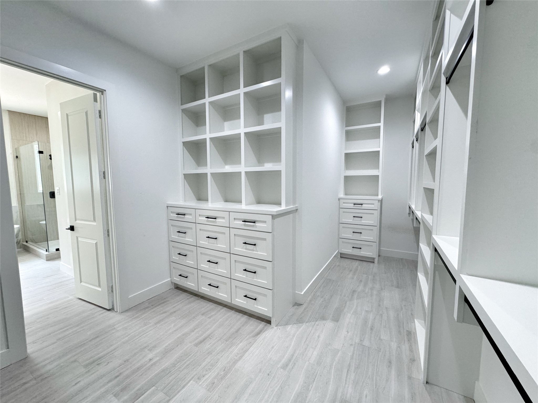 27710 Colapis Drive Splendora, TX 77372 - Photo 31 of 49 wooden floor in an empty room with a closet
