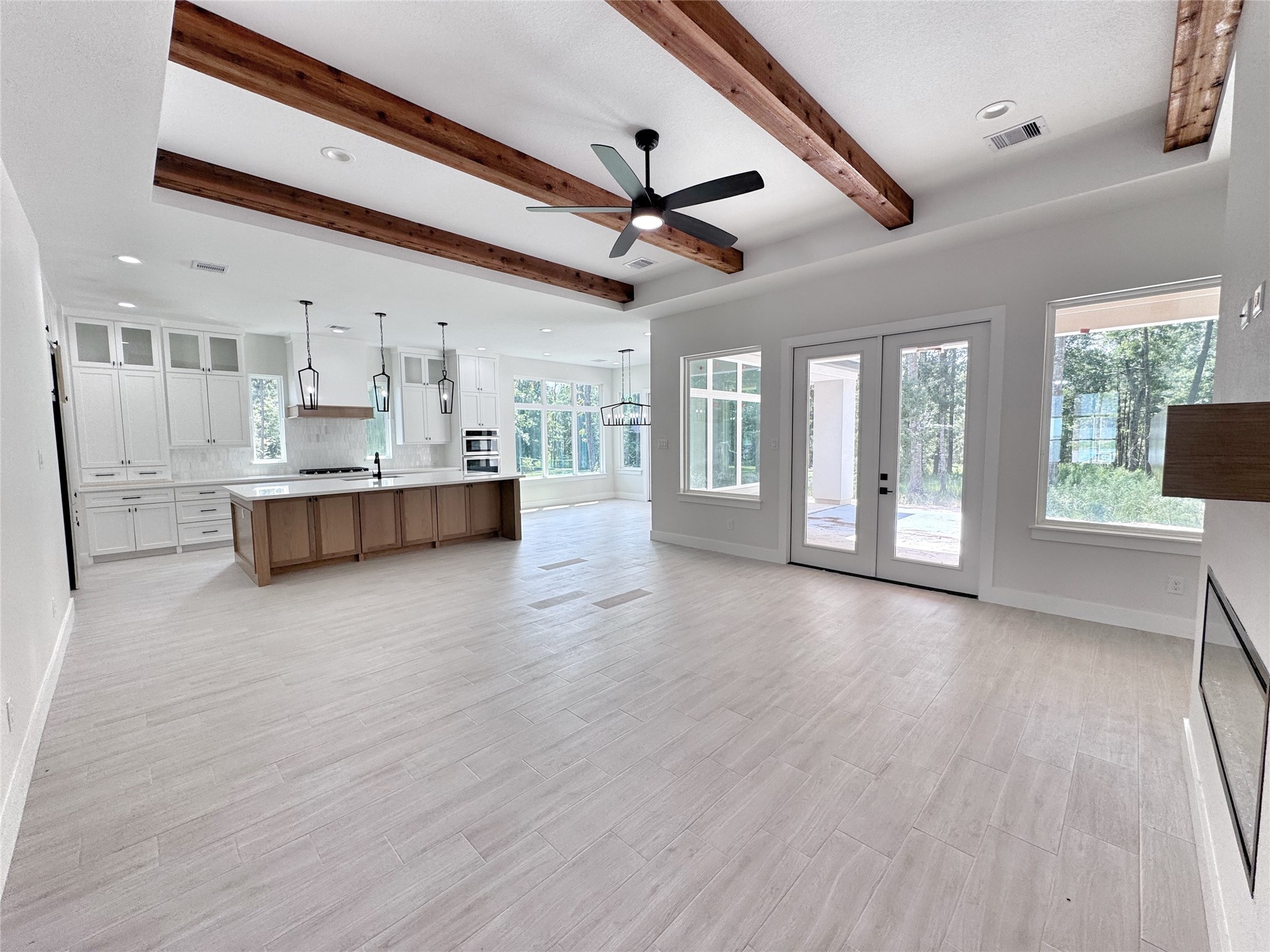 27710 Colapis Drive Splendora, TX 77372 - Photo 10 of 49 a view of a livingroom with furniture and windows