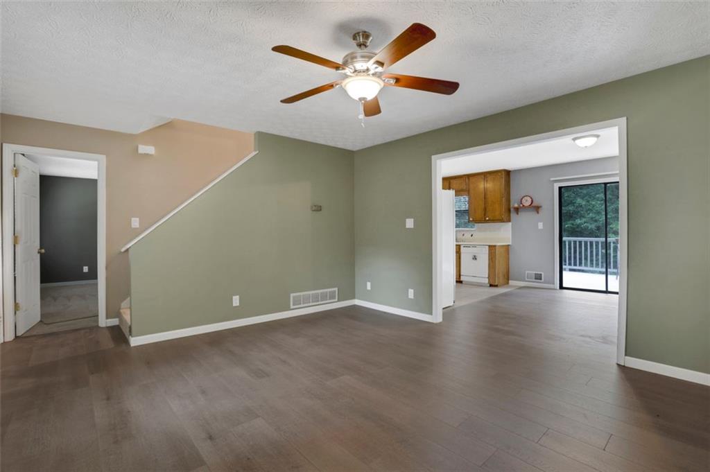 4378 Ridge Court Loganville, GA 30052 - Photo 5 of 47 an empty room with closet and a ceiling fan