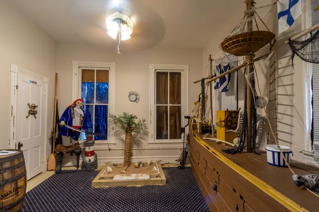 a view of a workspace with furniture