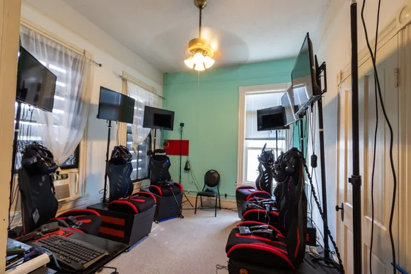 a living room with a furniture and a wooden floor