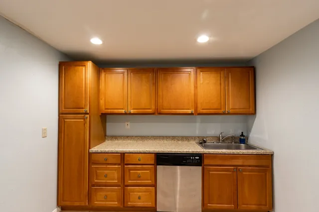 an empty room with a bench