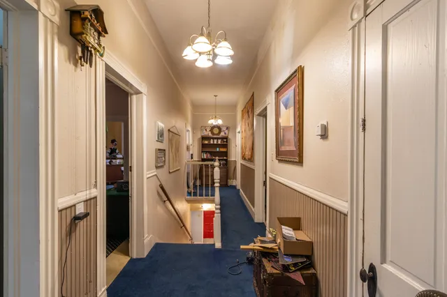 a view of a hallway with workspace