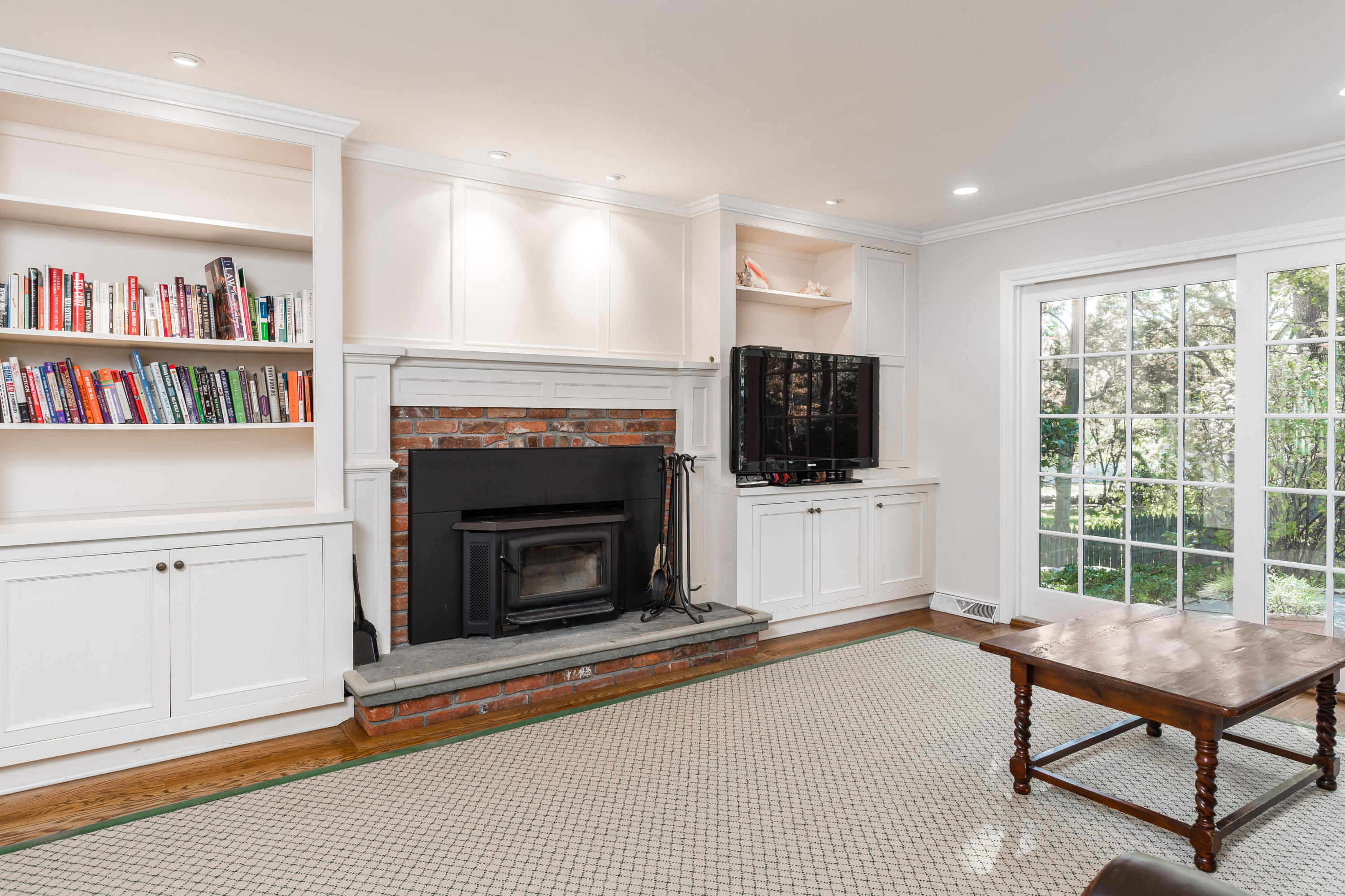 21 Barringer Road Darien, CT 06820 - Photo 11 of 34 a living room with furniture and a fireplace
