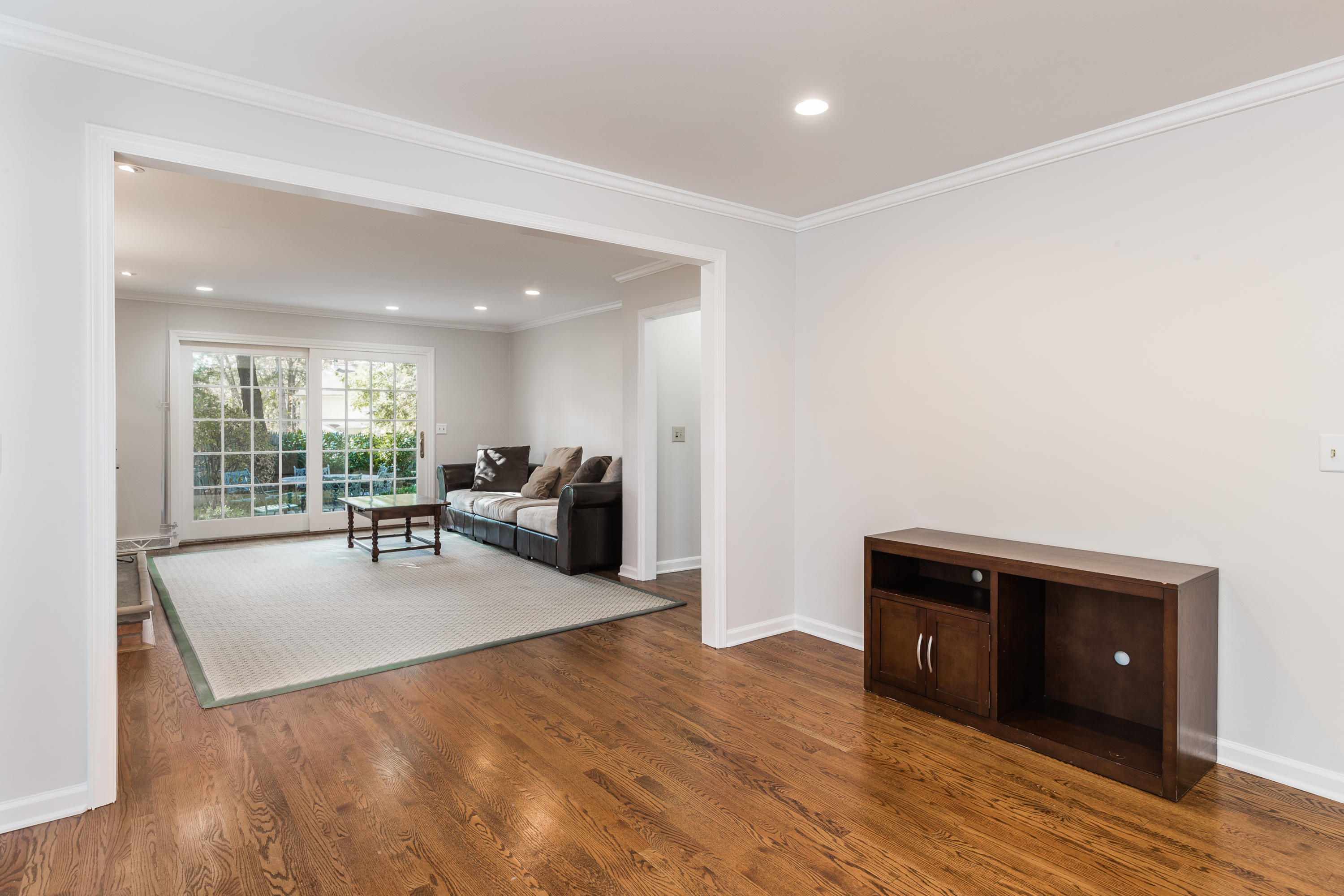 21 Barringer Road Darien, CT 06820 - Photo 12 of 34 a living room with furniture and a wooden floor